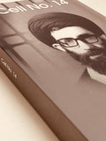 Close-up of 'Cell No. 14' book cover featuring a black-and-white portrait of a bearded man with glasses and a turban, Islamic literature.