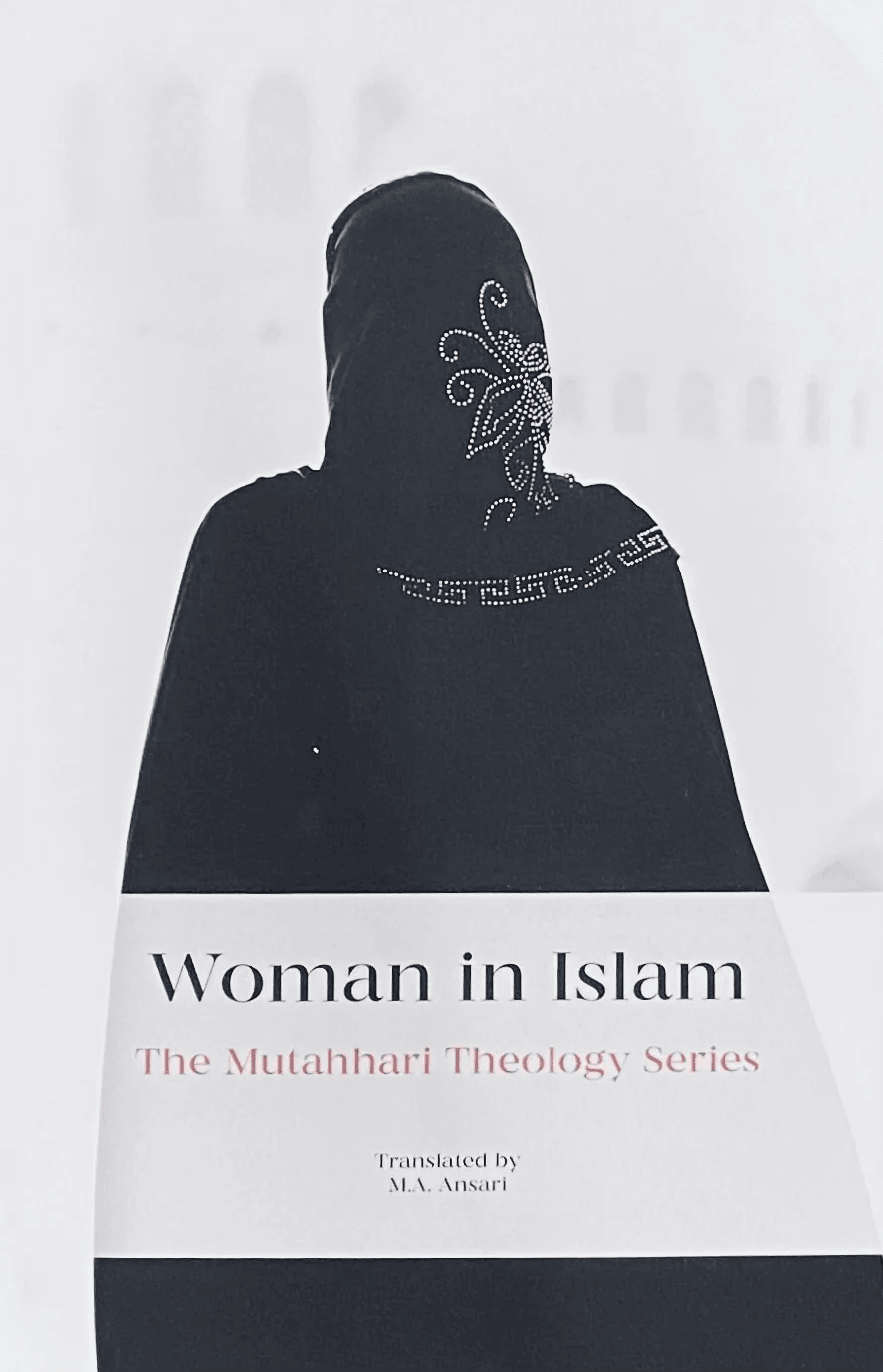 Book cover of 'Woman in Islam' showing woman in black hijab with decorative rhinestones