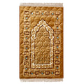 Gold prayer mat with Islamic geometric patterns and floral accents, featuring a central arch design.