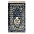 Gray Islamic prayer mat with intricate floral and geometric patterns