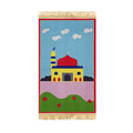 Kids prayer mat with colorful mosque illustration, crescent moon, clouds, and flowers
