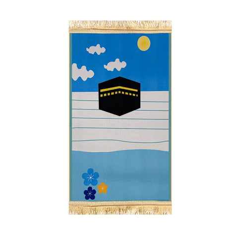 Kids prayer mat with Kaaba illustration, blue sky, sun, clouds, and decorative flowers